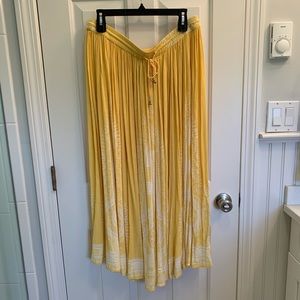 Yellow flowing maxi skirt